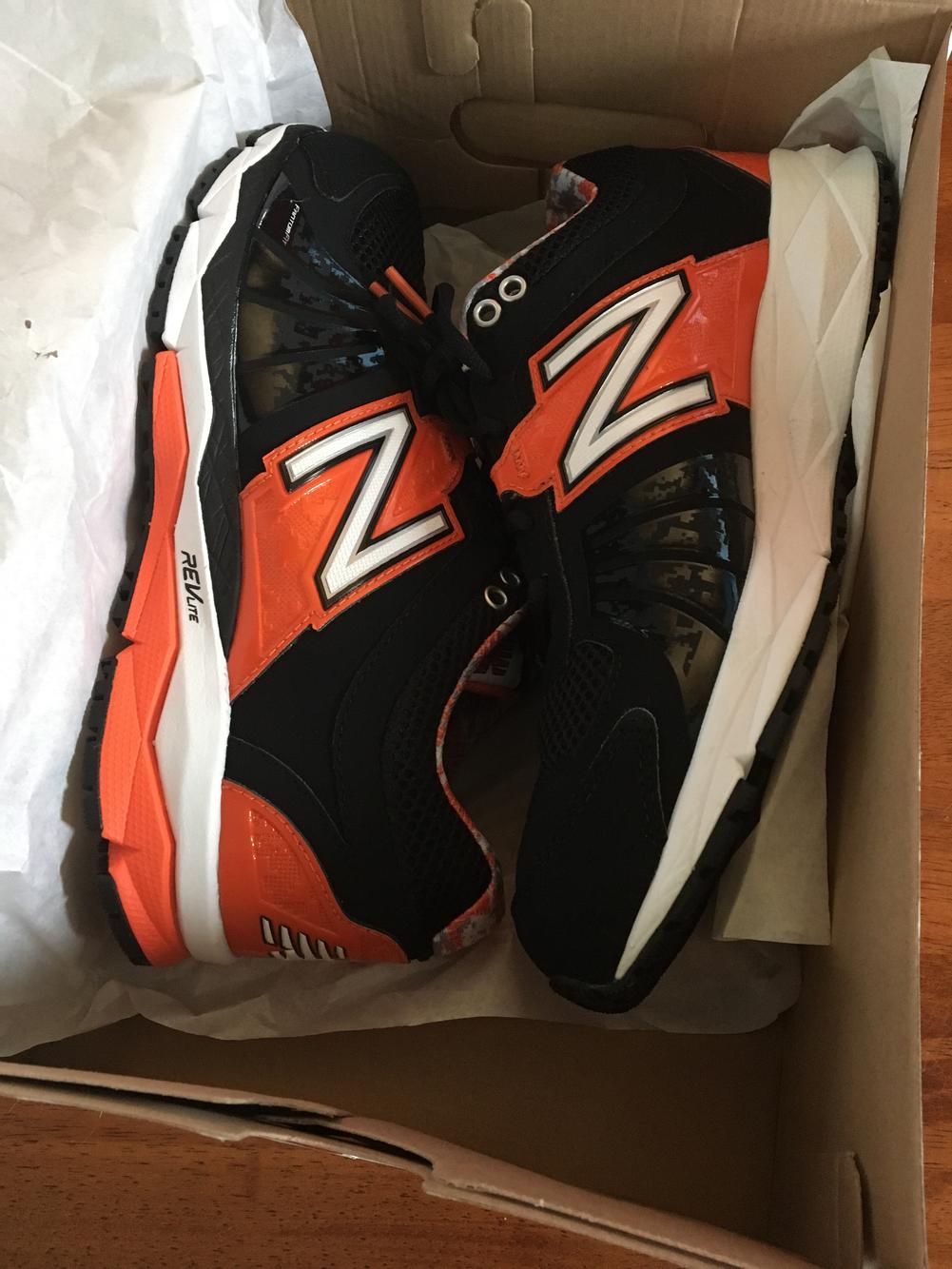 New balance turf shoes size 9 black orange new SidelineSwap