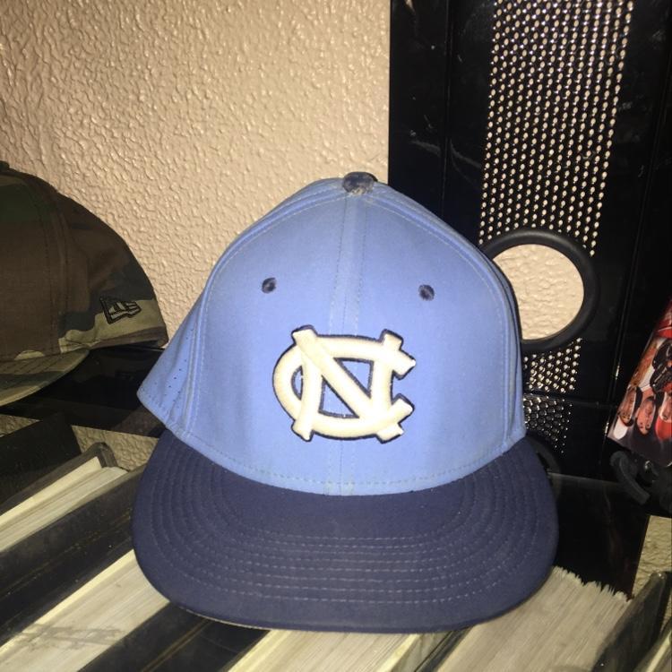 on field college baseball hats