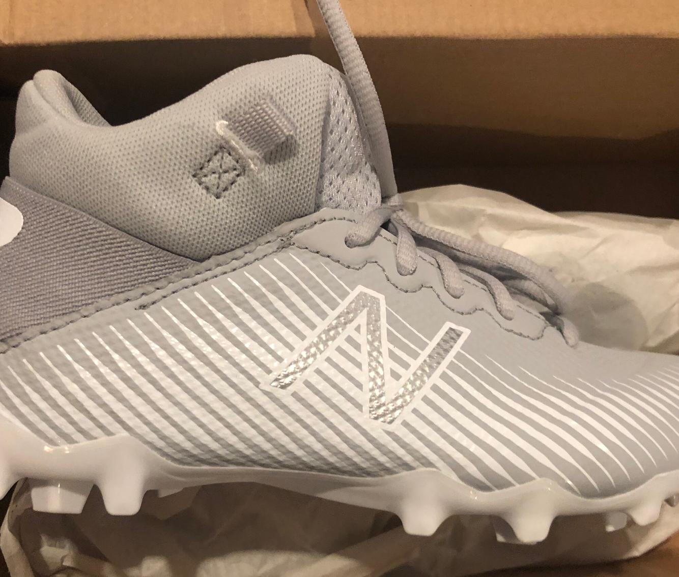 new balance lax cleats
