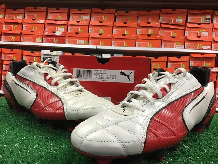 red black and white soccer cleats