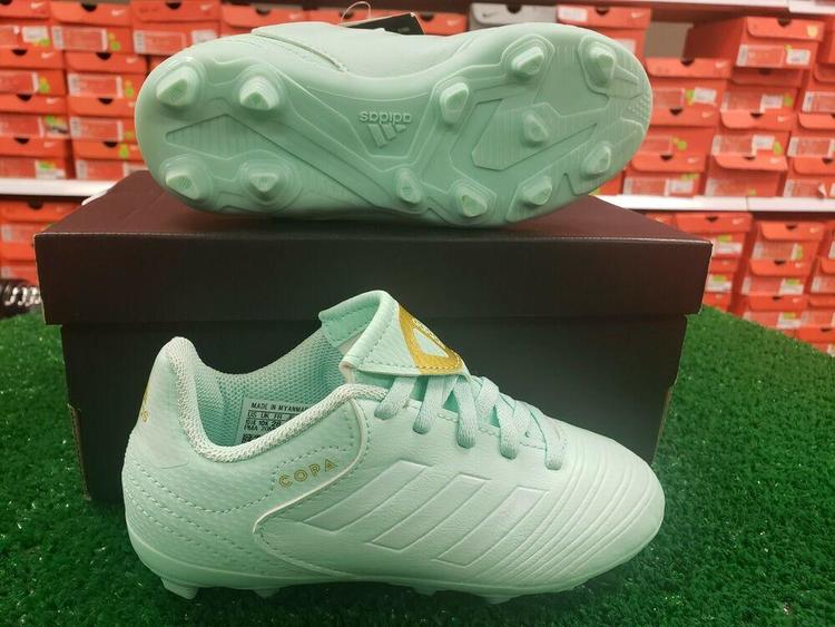 mint green soccer cleats