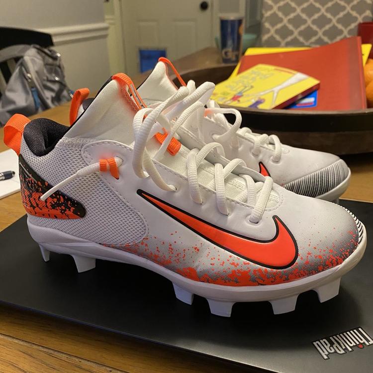 orange youth football cleats