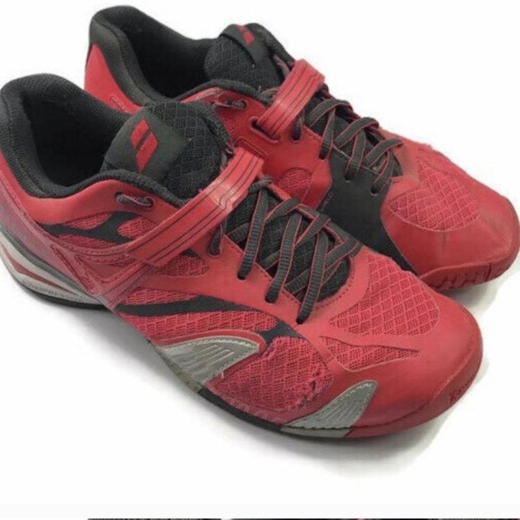 red and black tennis shoes