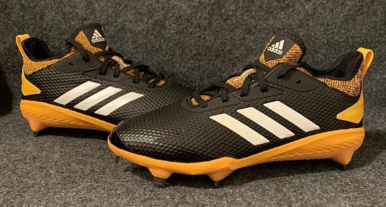 yellow baseball cleats