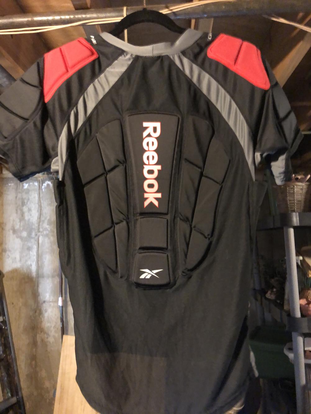 Lightly Used Adult XL Reebok Padded Shirt Hockey Football