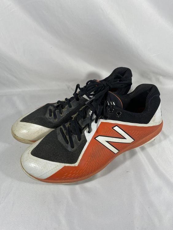 orange and black softball cleats