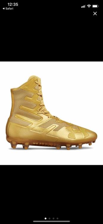 gold and white under armour football cleats