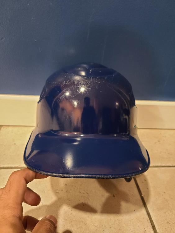Single flap batting helmet