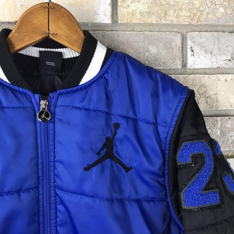 black and royal blue nike shirt