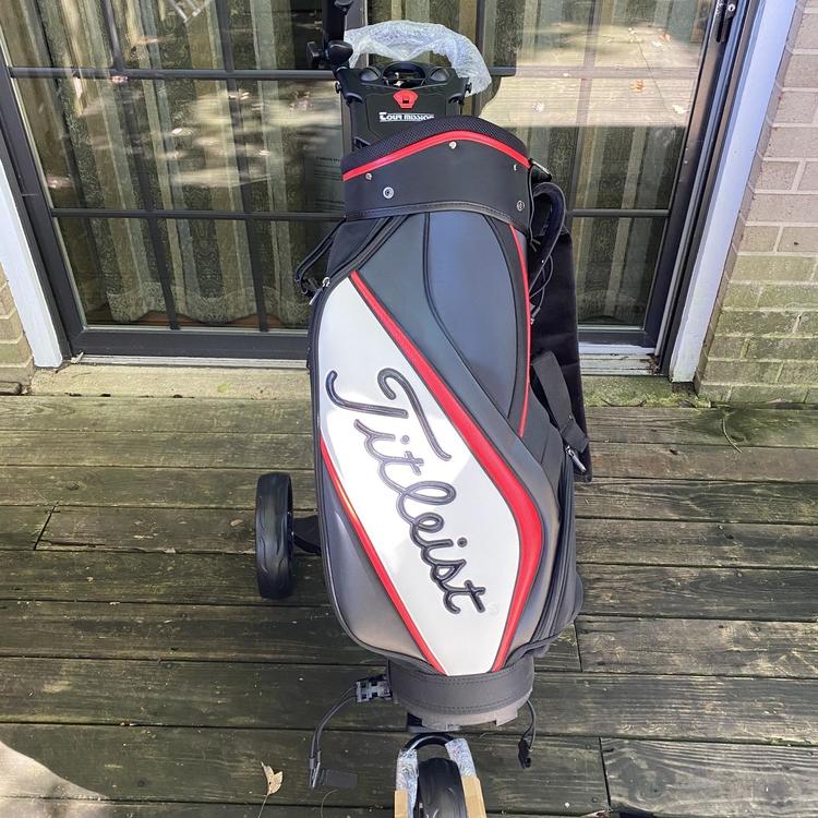 staff bag on push cart