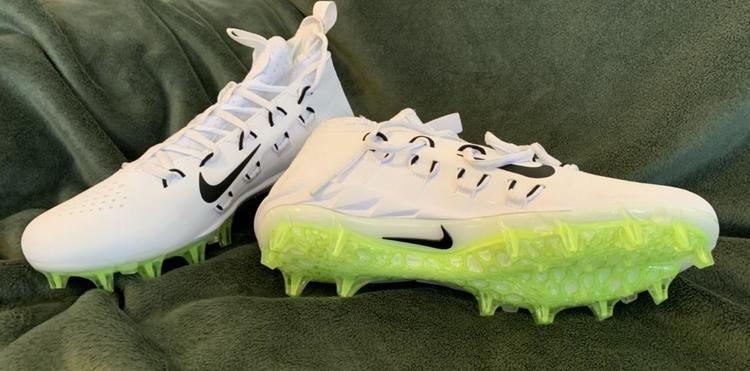 white molded cleats