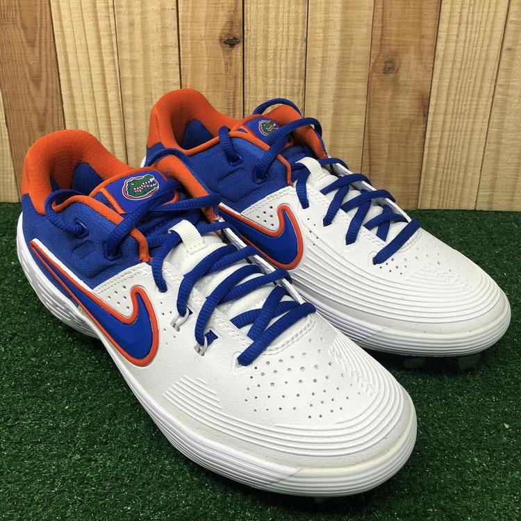 orange and blue baseball cleats
