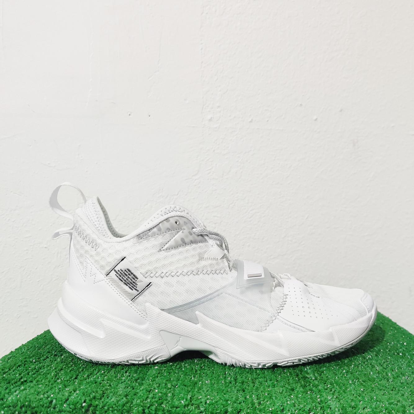 triple white basketball shoes