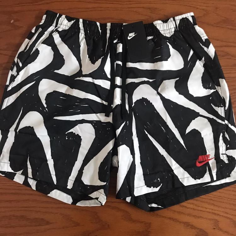 swoosh woven shorts