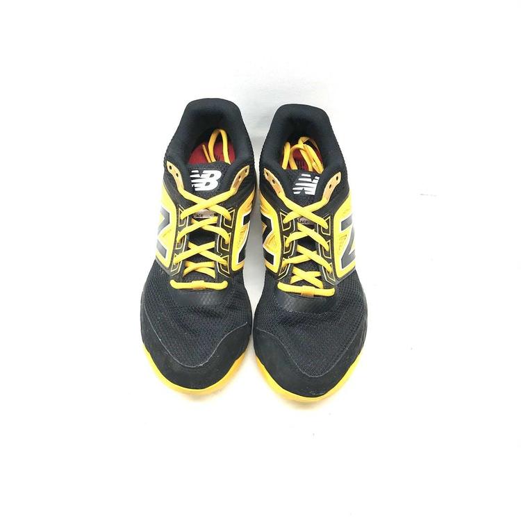 new balance black and yellow turf shoes