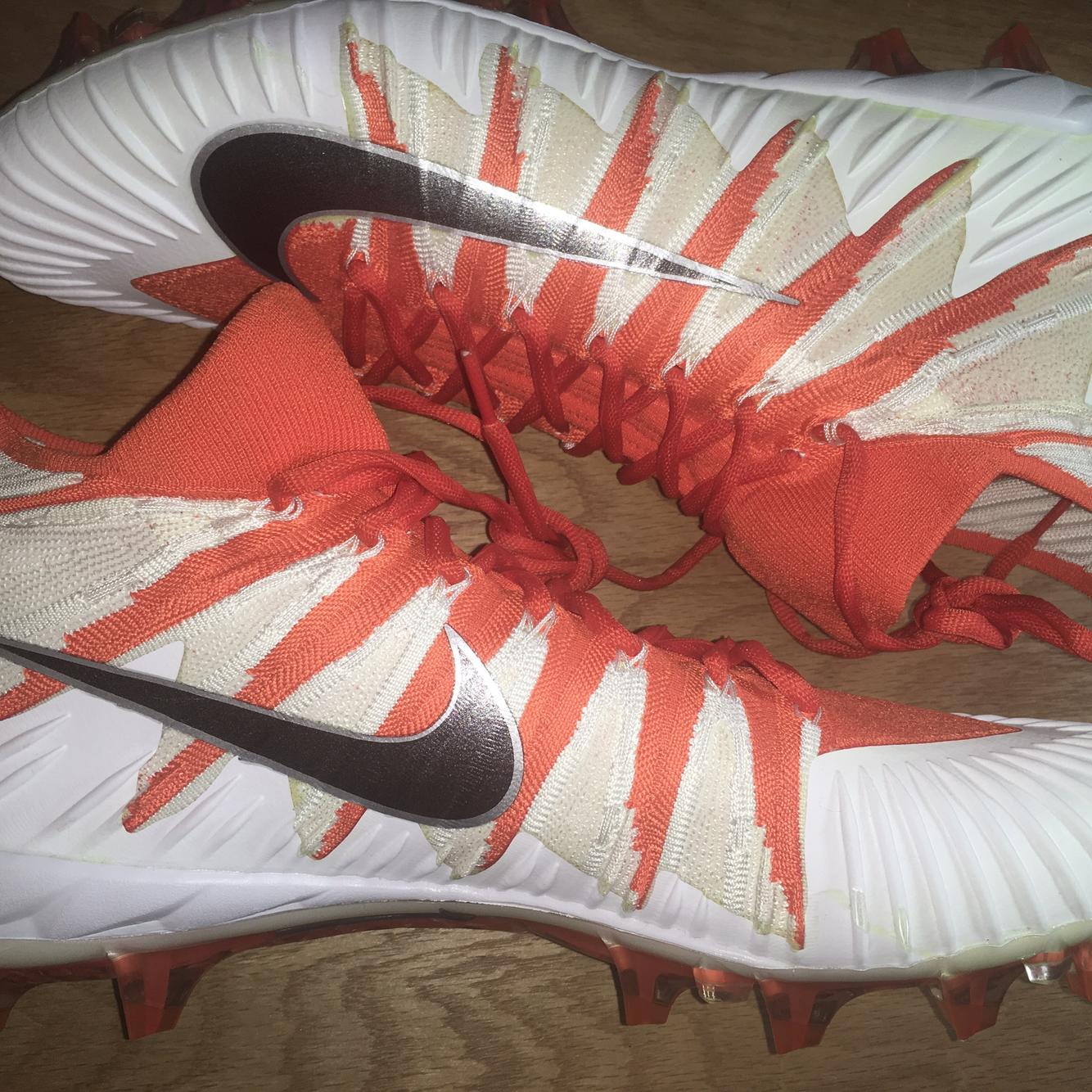 orange football cleats size 7