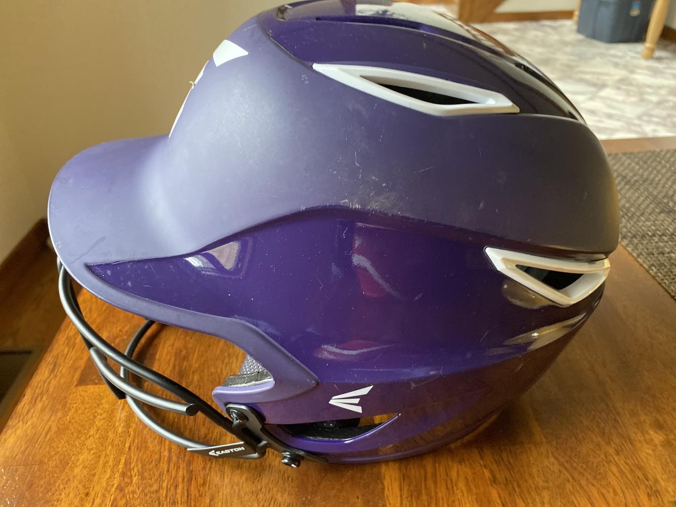 Easton Z7 batting helmet with cage; purple plus Extra Schutt Fielders