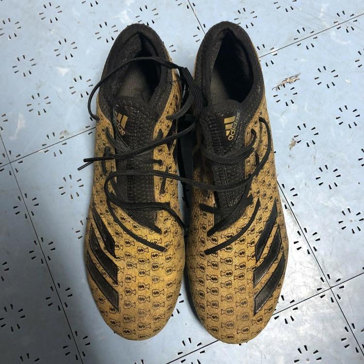 gold money bag cleats