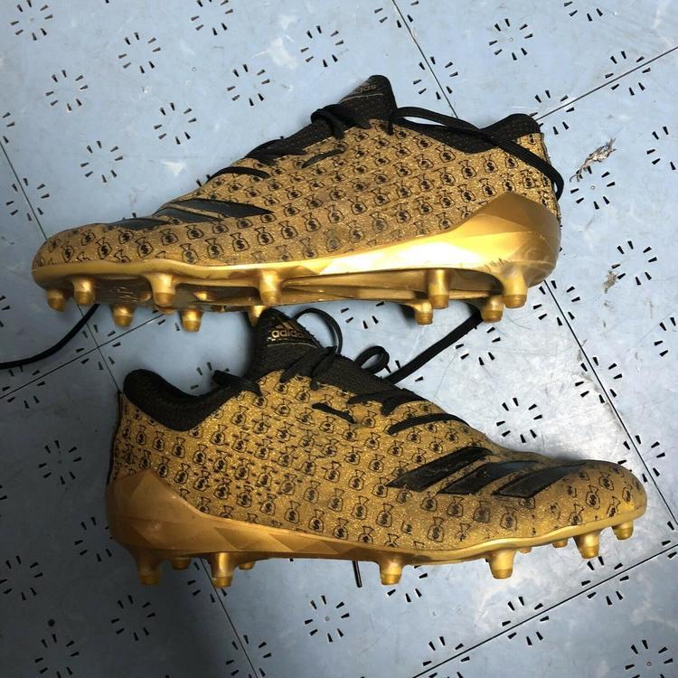 gold money bag cleats