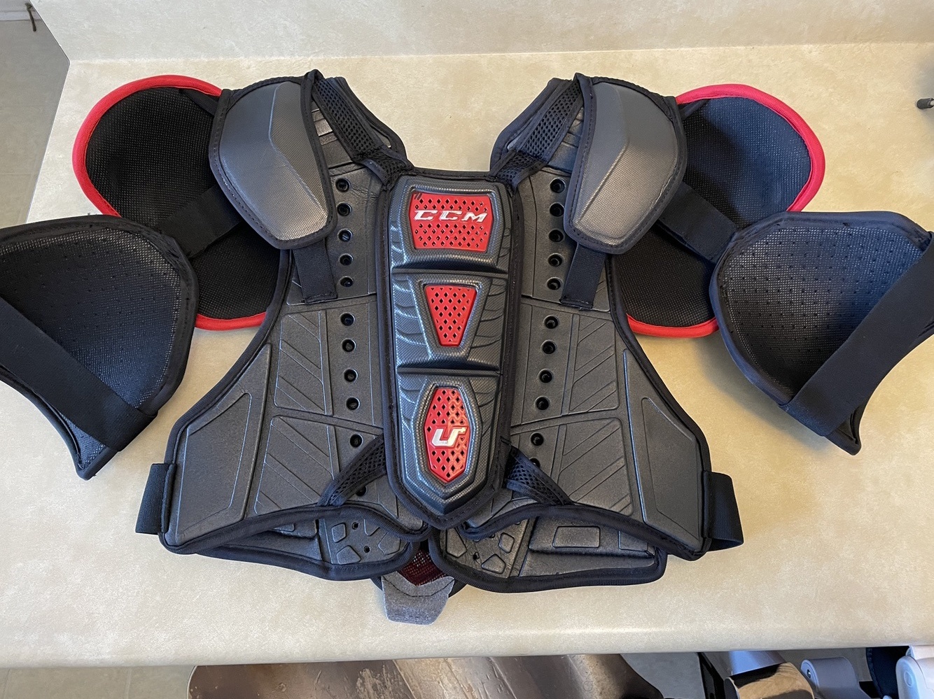 New Pro Stock CCM U+ Crazy Light Shoulder Pads SidelineSwap