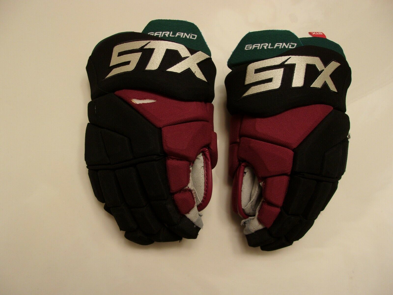 Arizona Coyotes Conor Garland gameworn STX Surgeon 14inch throwback
