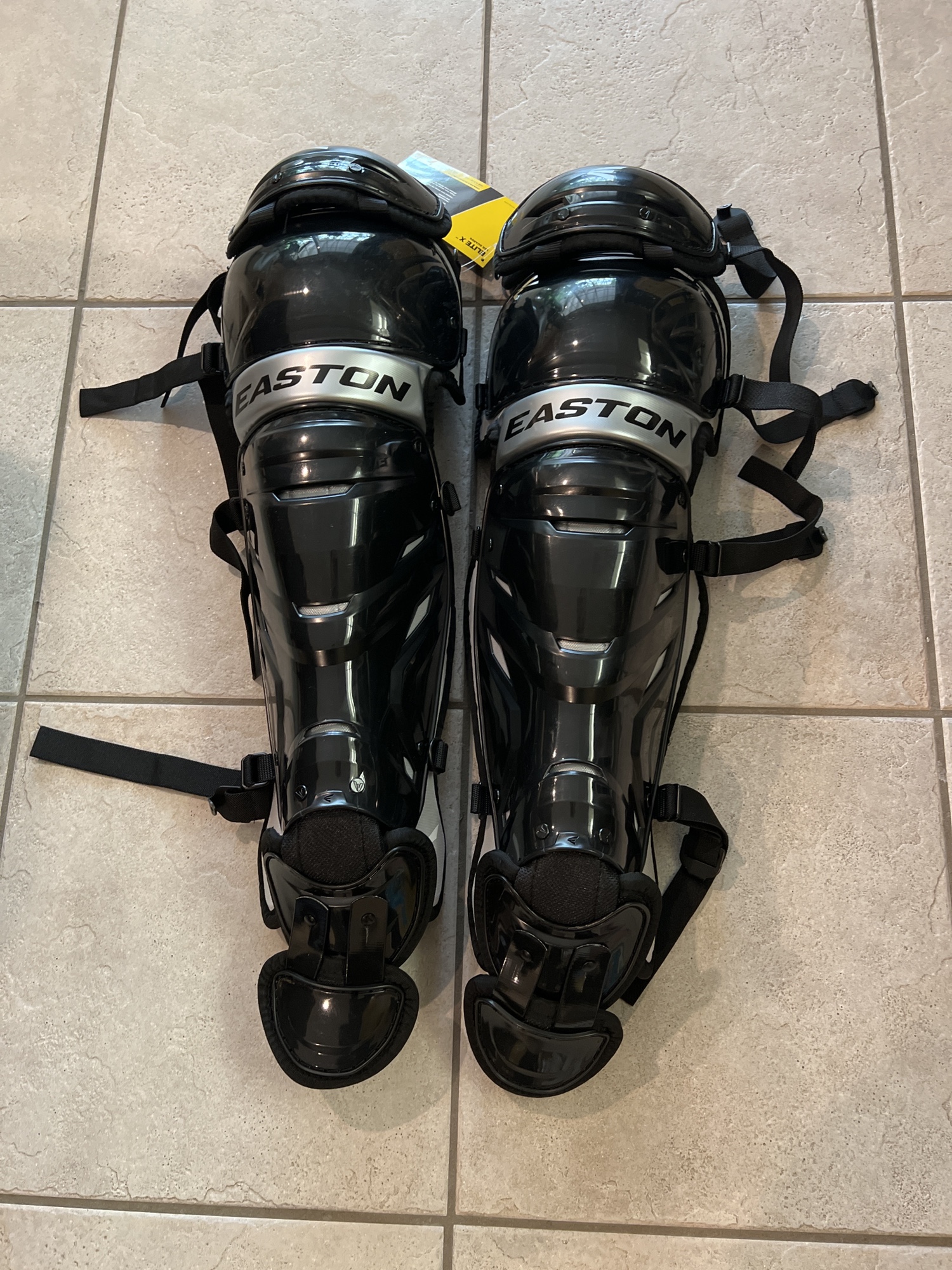 Brand new intermediate Easton Elite X Catcher's Leg Guard SidelineSwap