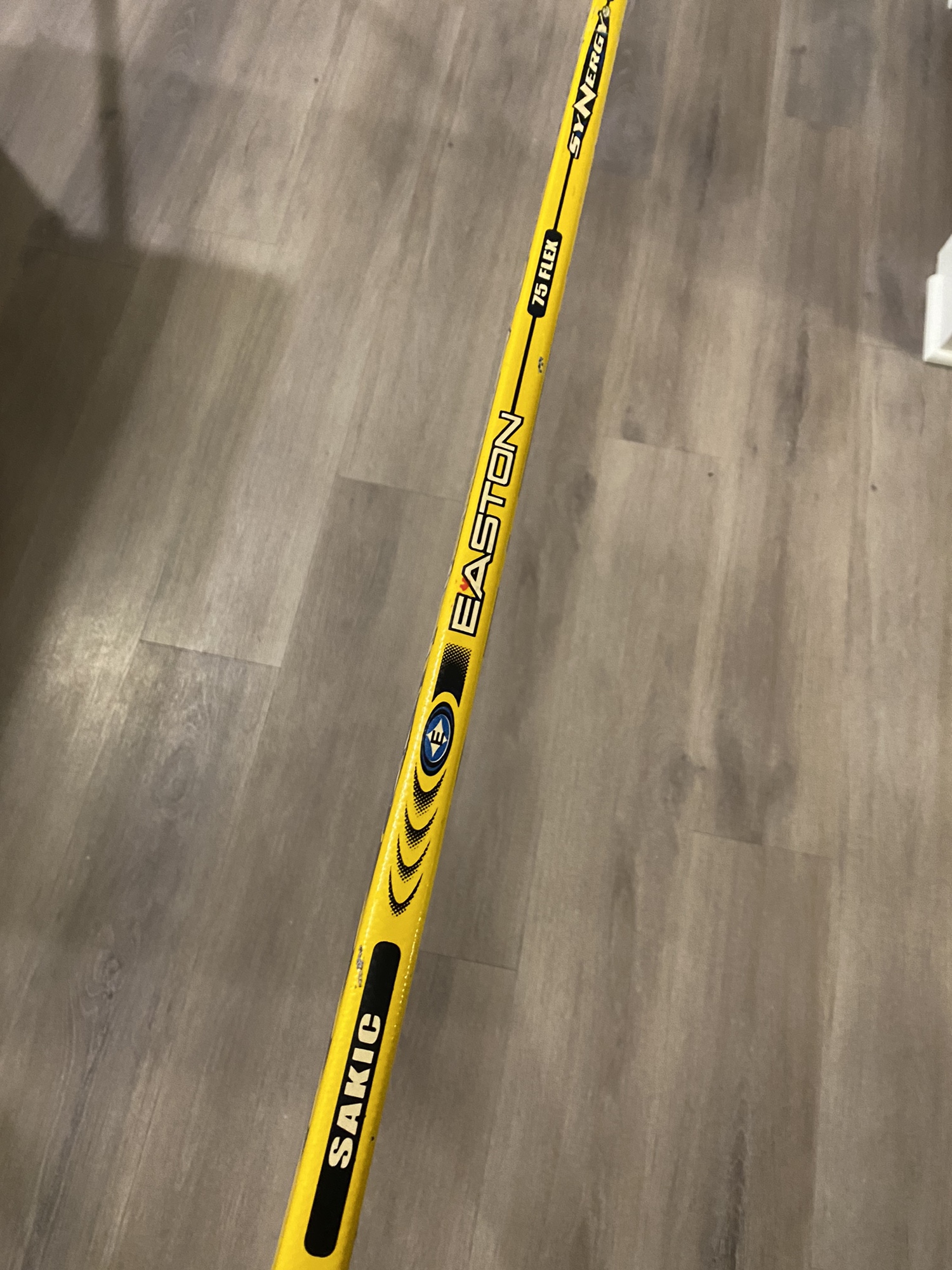 Used Left Hand Sakic Synergy Grip Hockey Stick Yellow Easton SidelineSwap