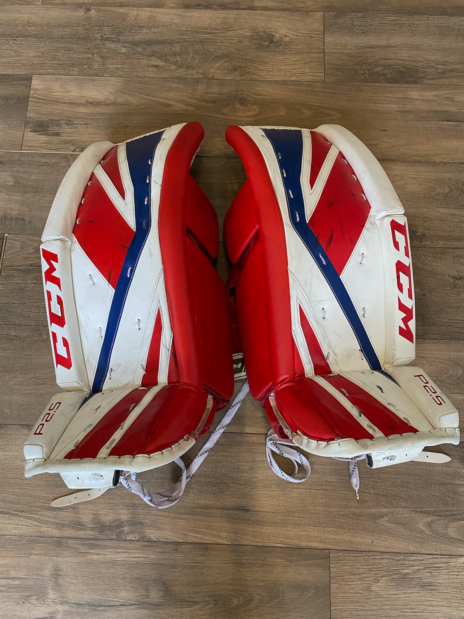 CCM P2.5 Junior 28+1” Goalie Leg Pads Red/White/Blue SidelineSwap