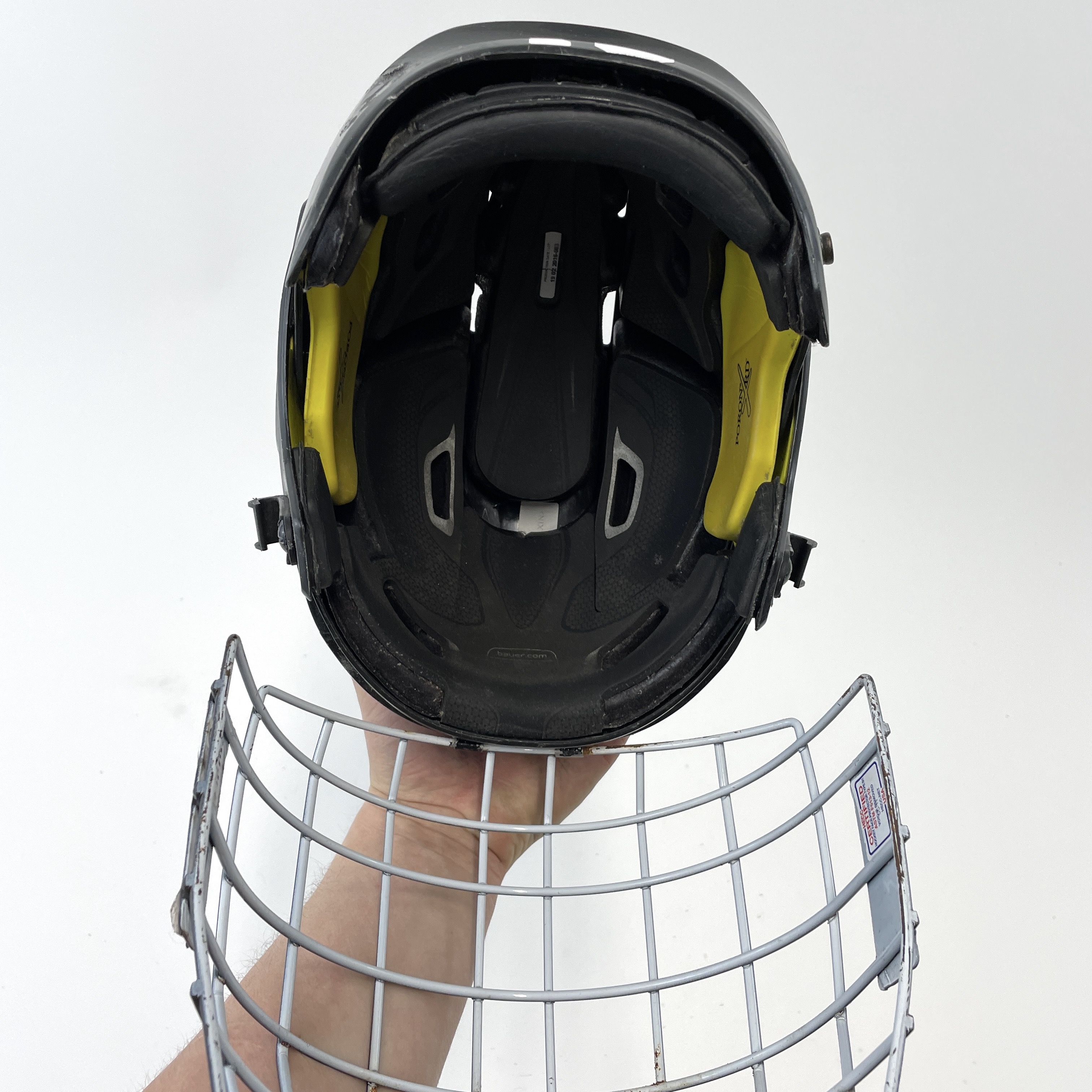 Used Black Bauer Reakt Pro Helmet with Medium Oreo Cage Senior Medium