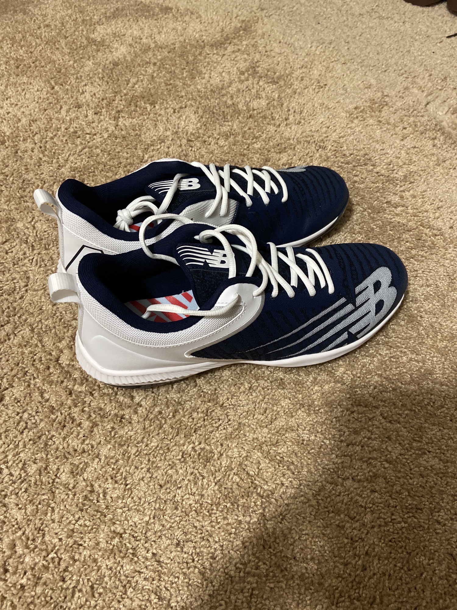 light blue new balance cleats