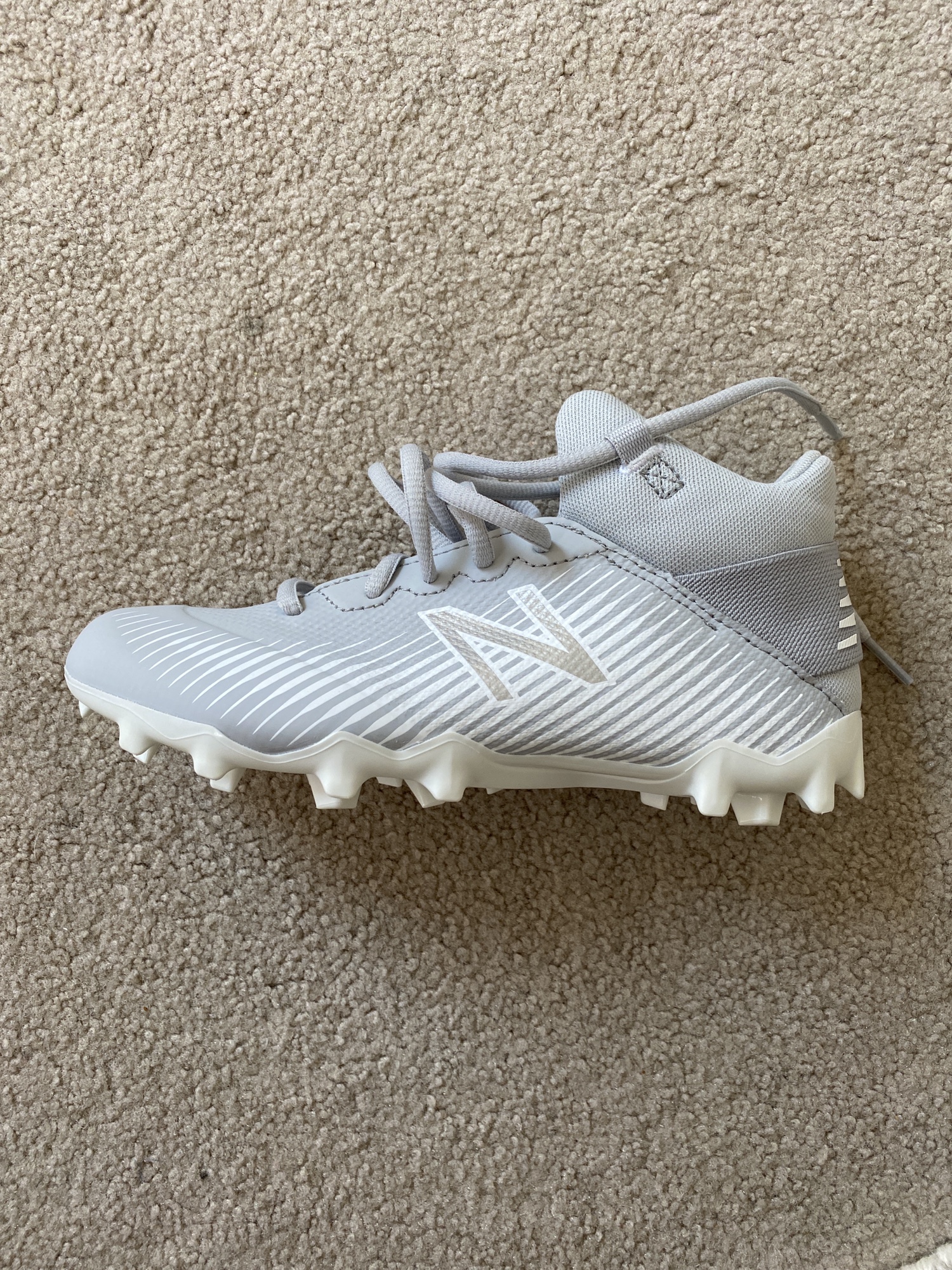 white new balance lacrosse cleats