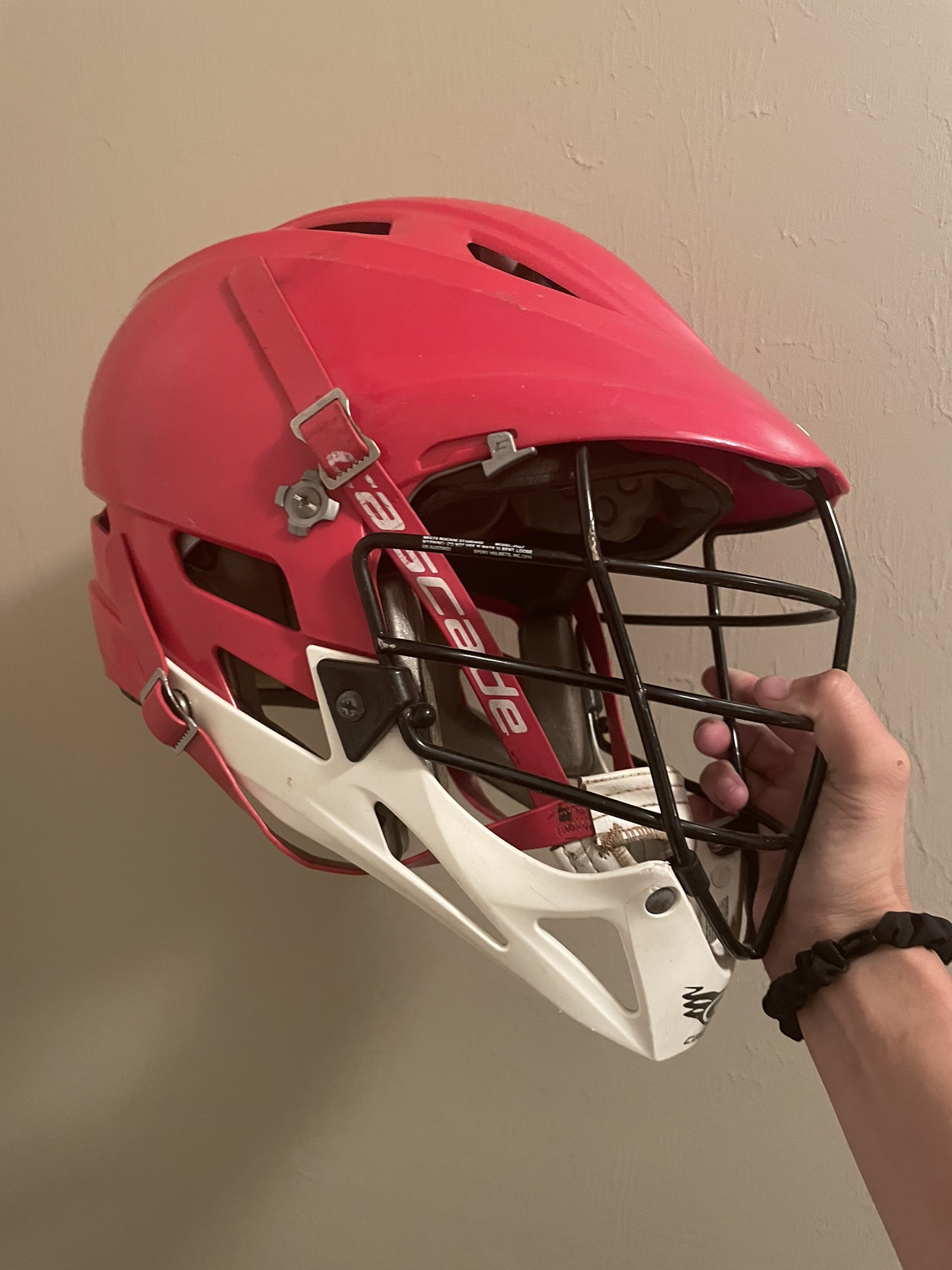 Red color pro 7 lacrosse helmet SidelineSwap