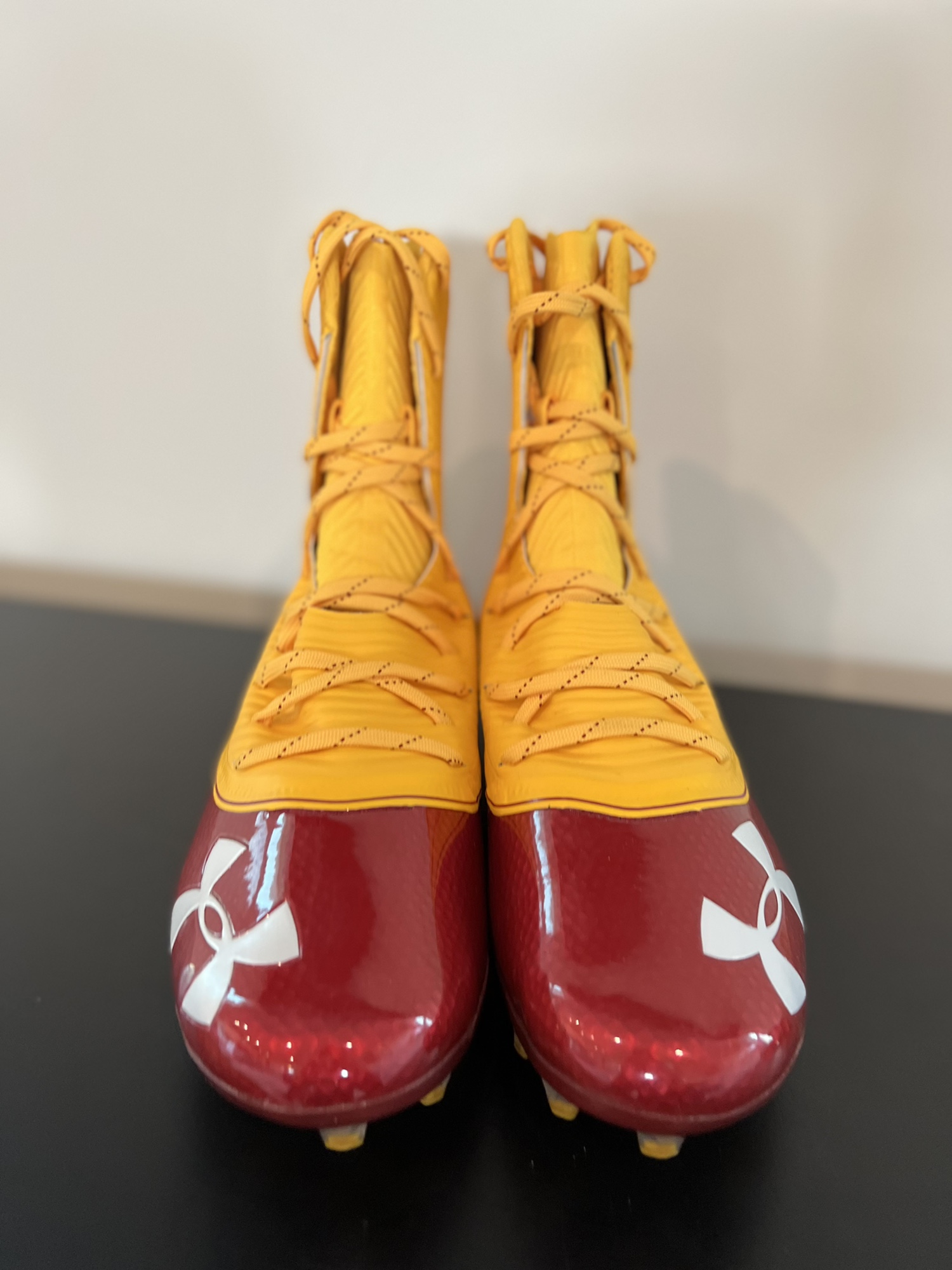 red and gold football cleats