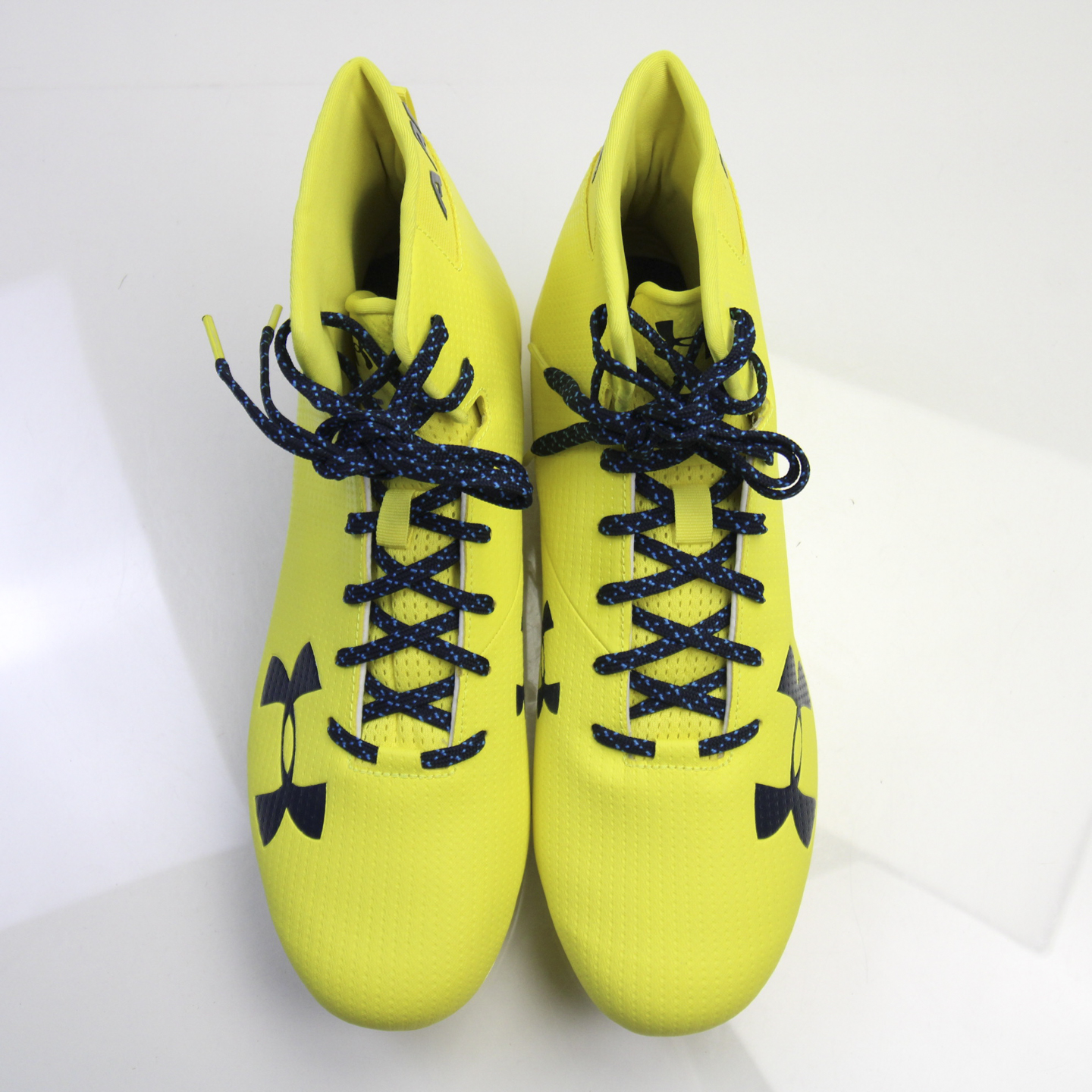 mens black and yellow football cleats