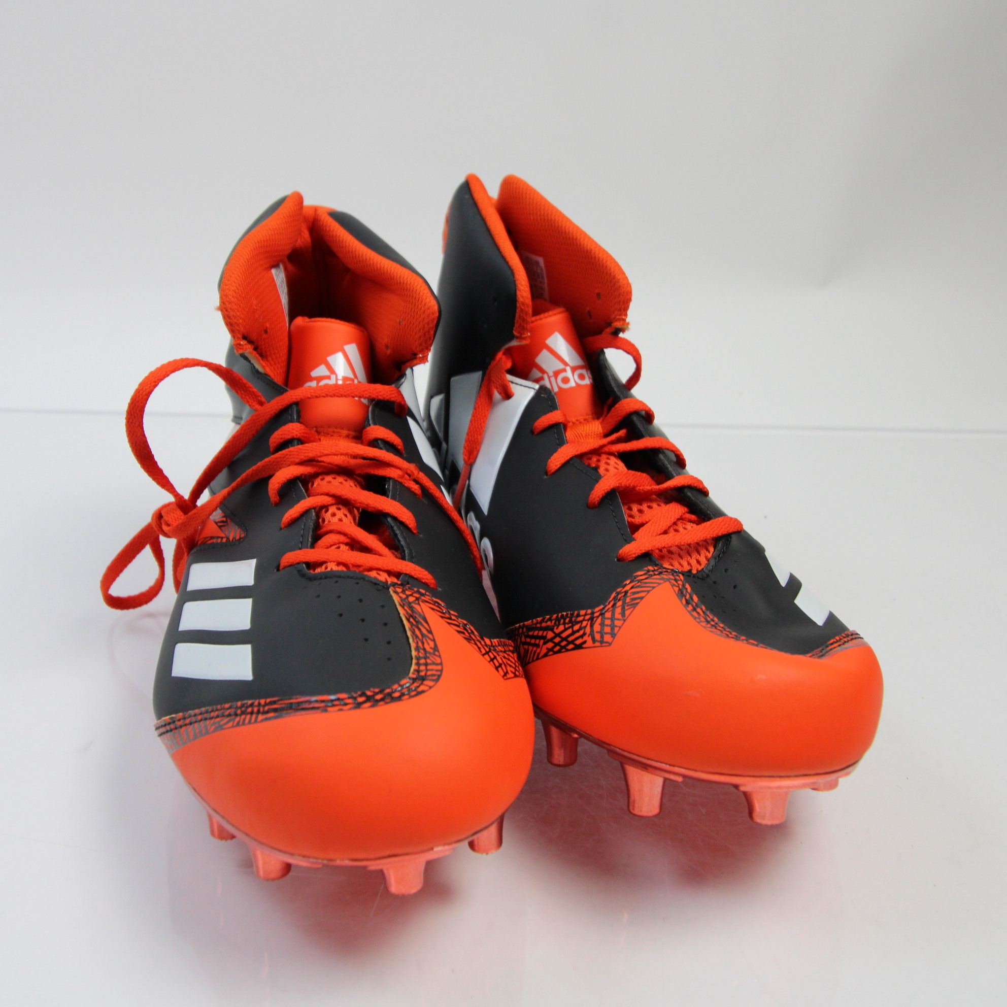 mens orange and black football cleats