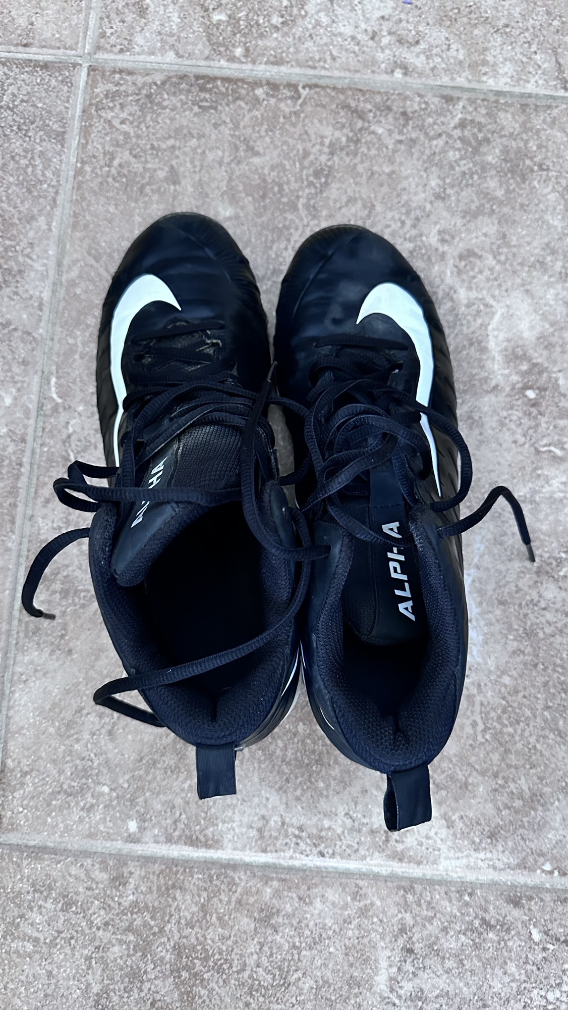 nike black and yellow cleats