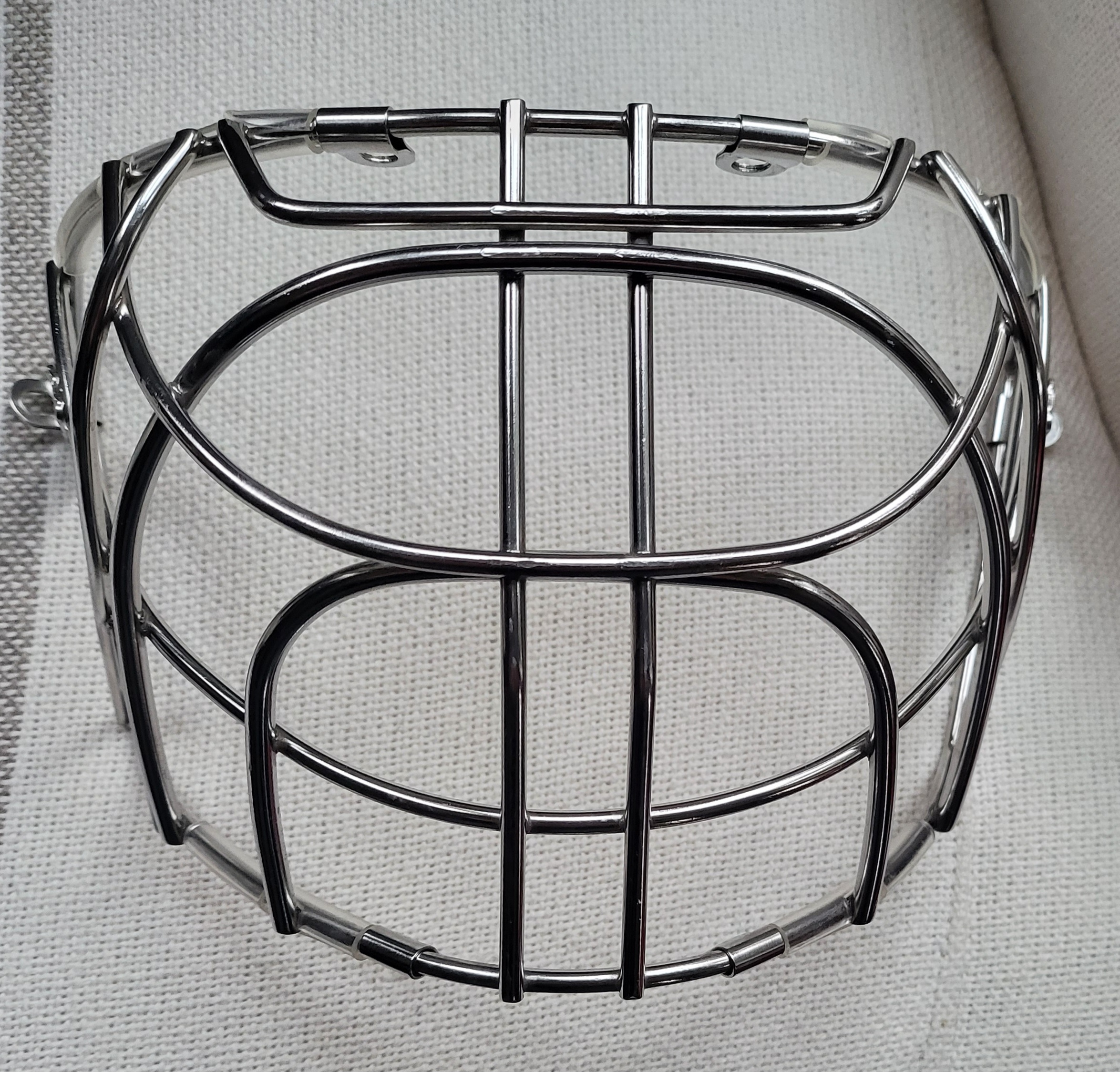 Used Bauer Certified Cat eye cage. SidelineSwap