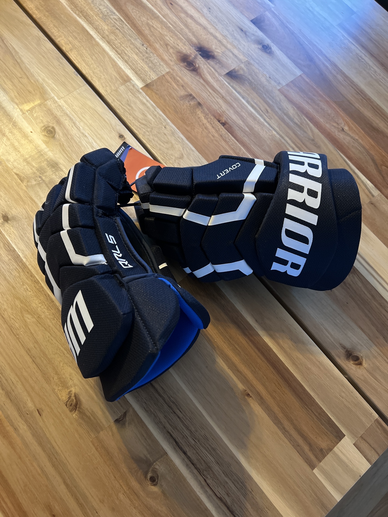 Brand new Warrior men’s hockey gloves 13” SidelineSwap