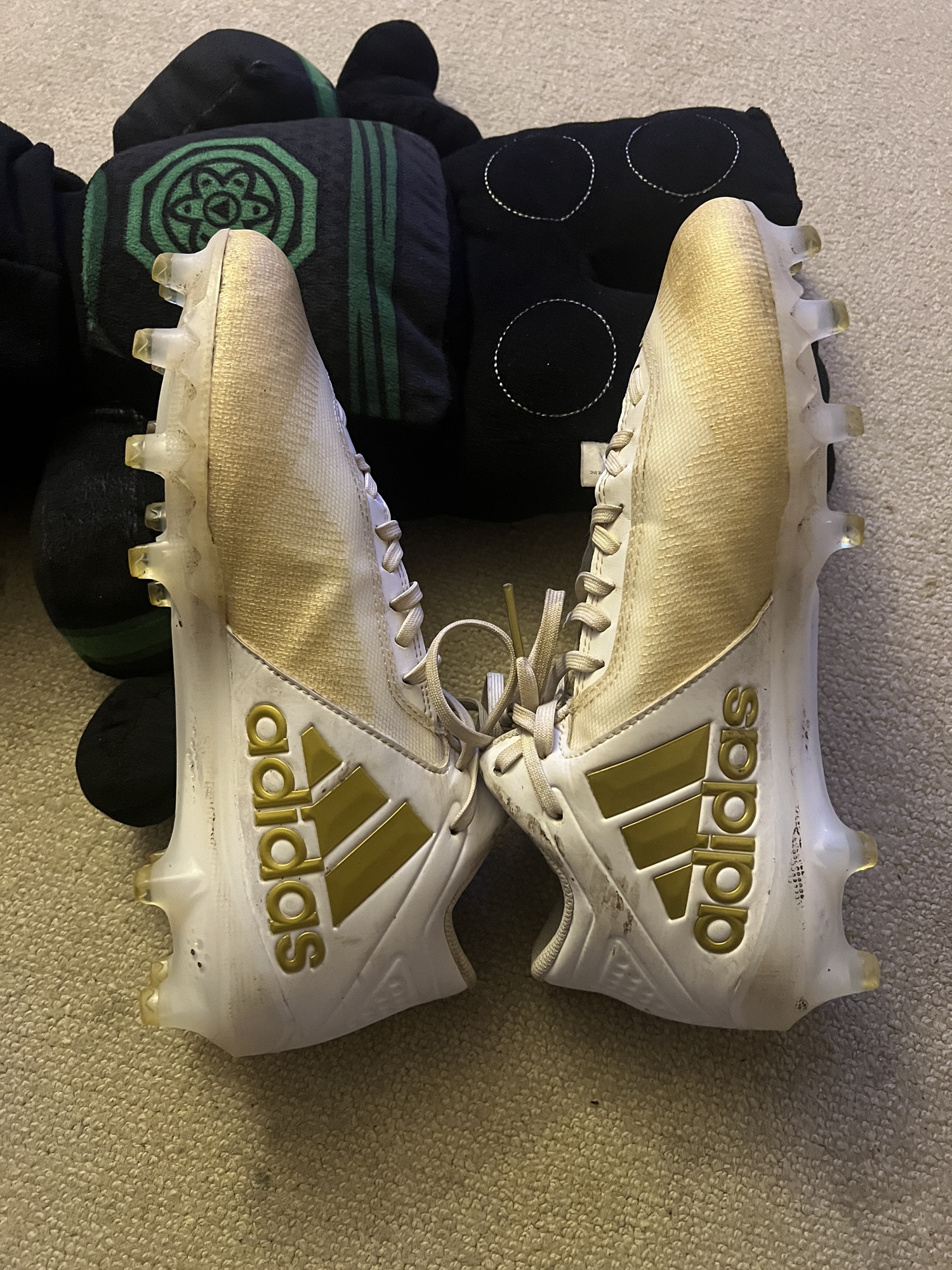 gold track cleats