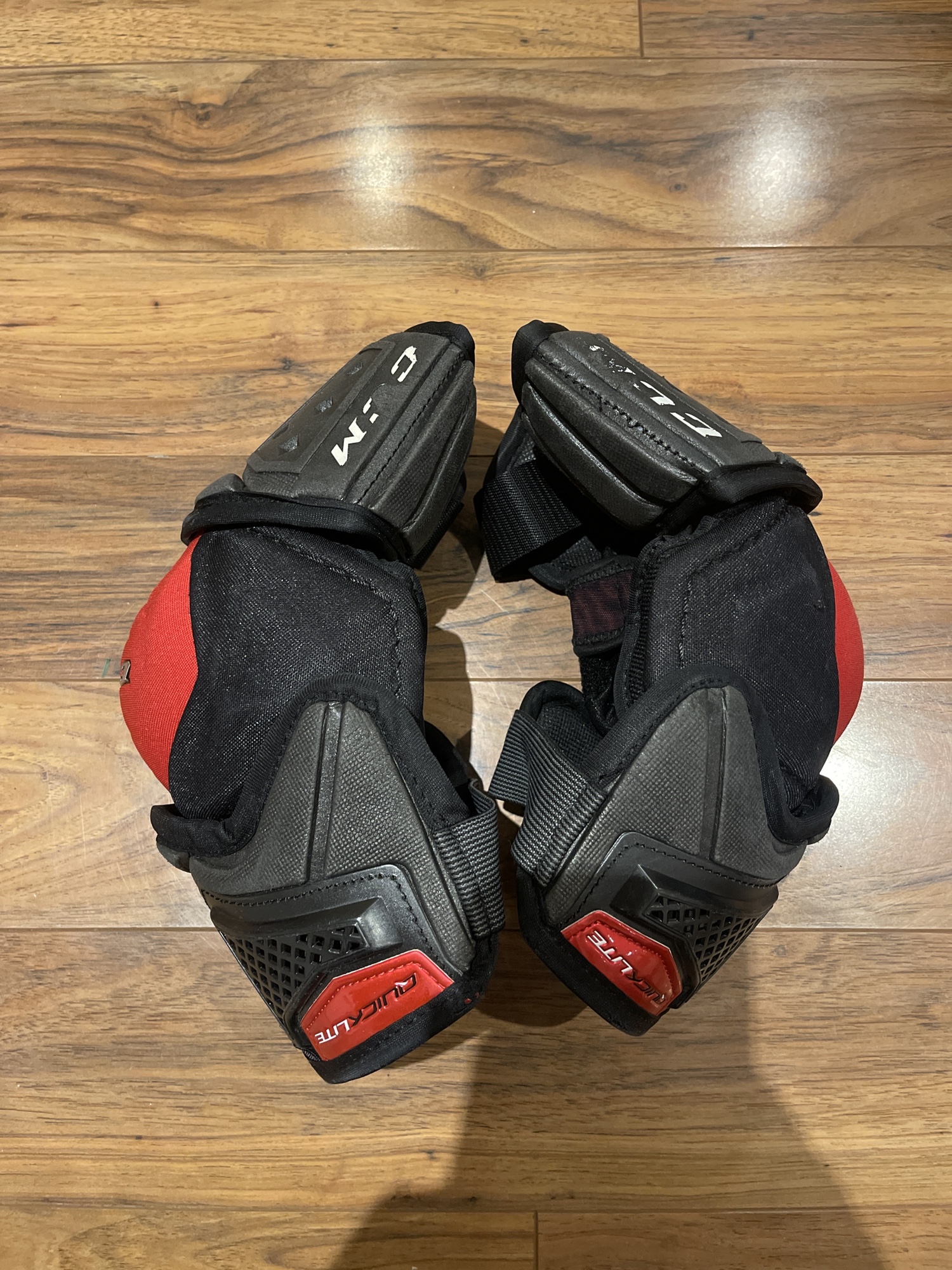 Used Large CCM QuickLite Elbow Pads SidelineSwap