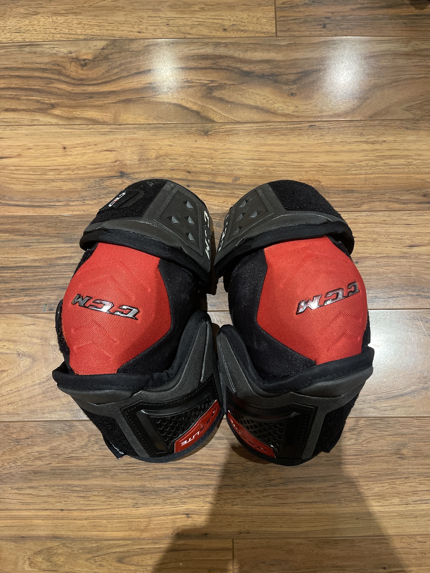 Used Large CCM QuickLite Elbow Pads SidelineSwap