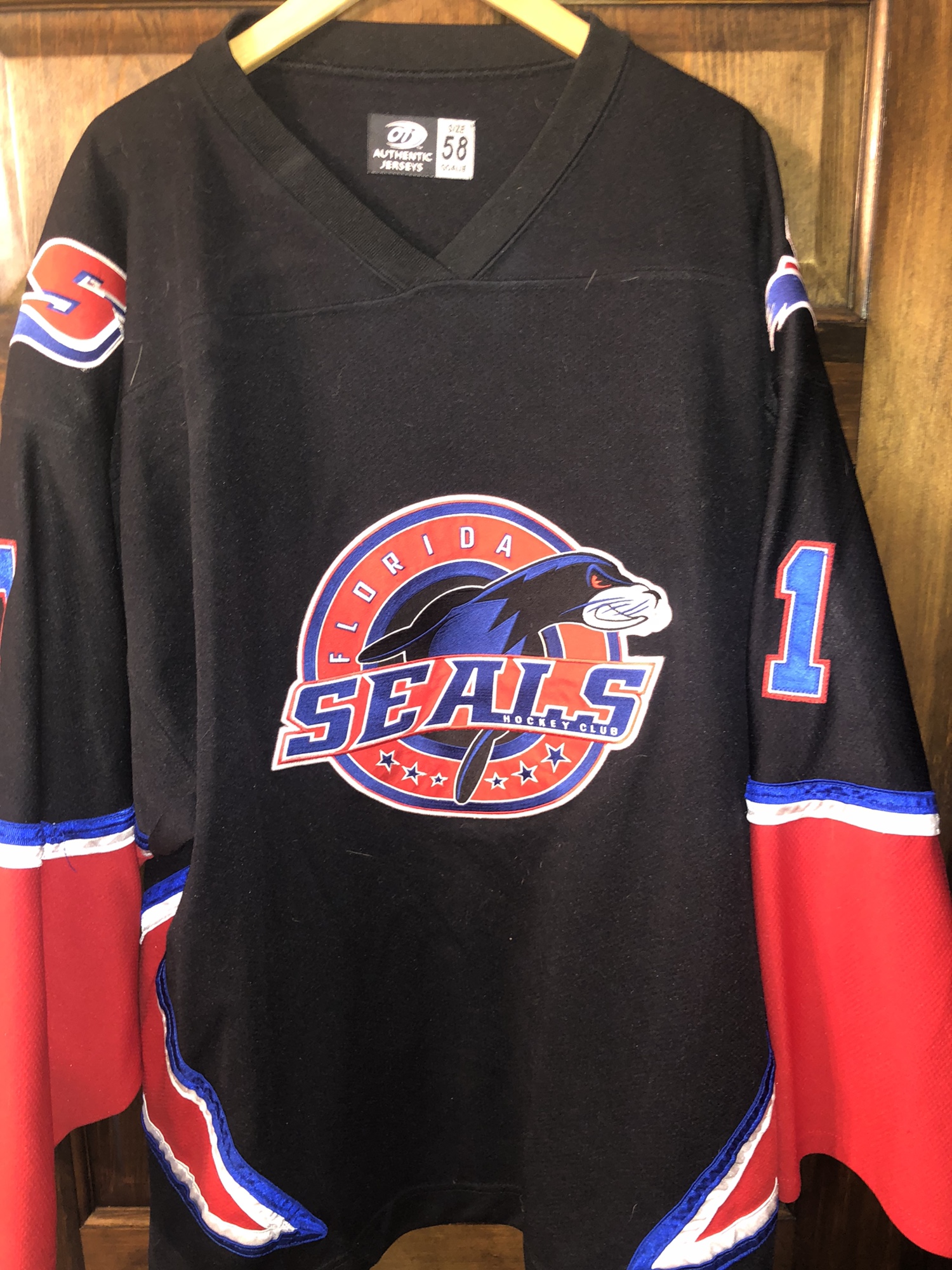 USED BLACK FLORIDIA SEALS HOCKEY JERSEY SIZE 58 SPHL WITH FIGHT STRAP