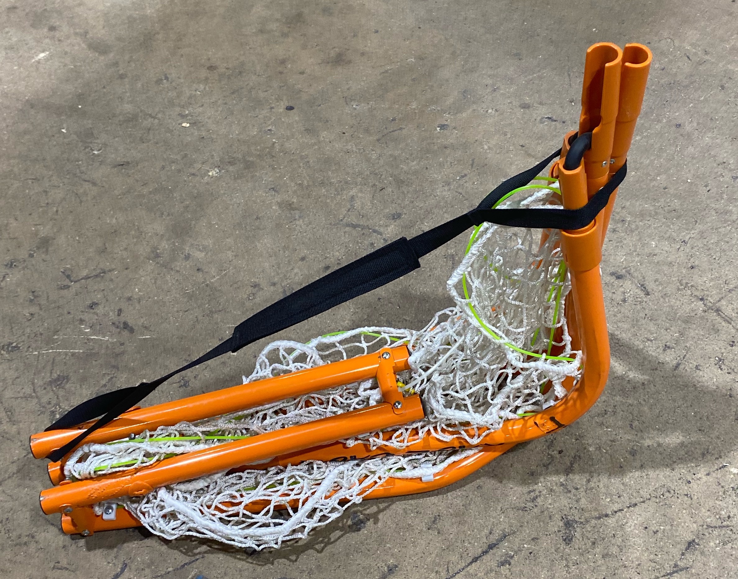 A preowned Rage Cage Mini Lacrosse Goal that's foldable, fully