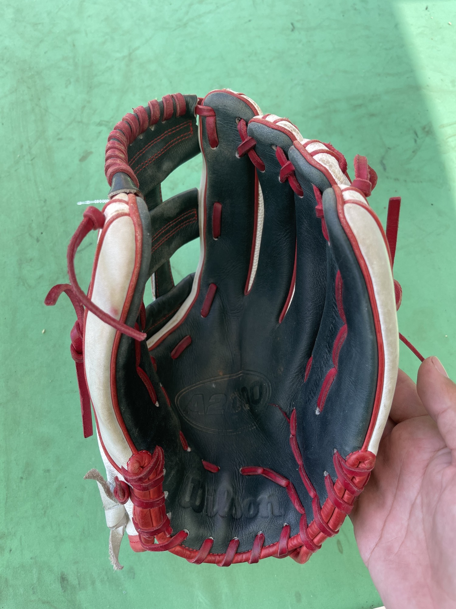 Used Wilson A2000 Right Hand Throw Softball Glove 12" SidelineSwap