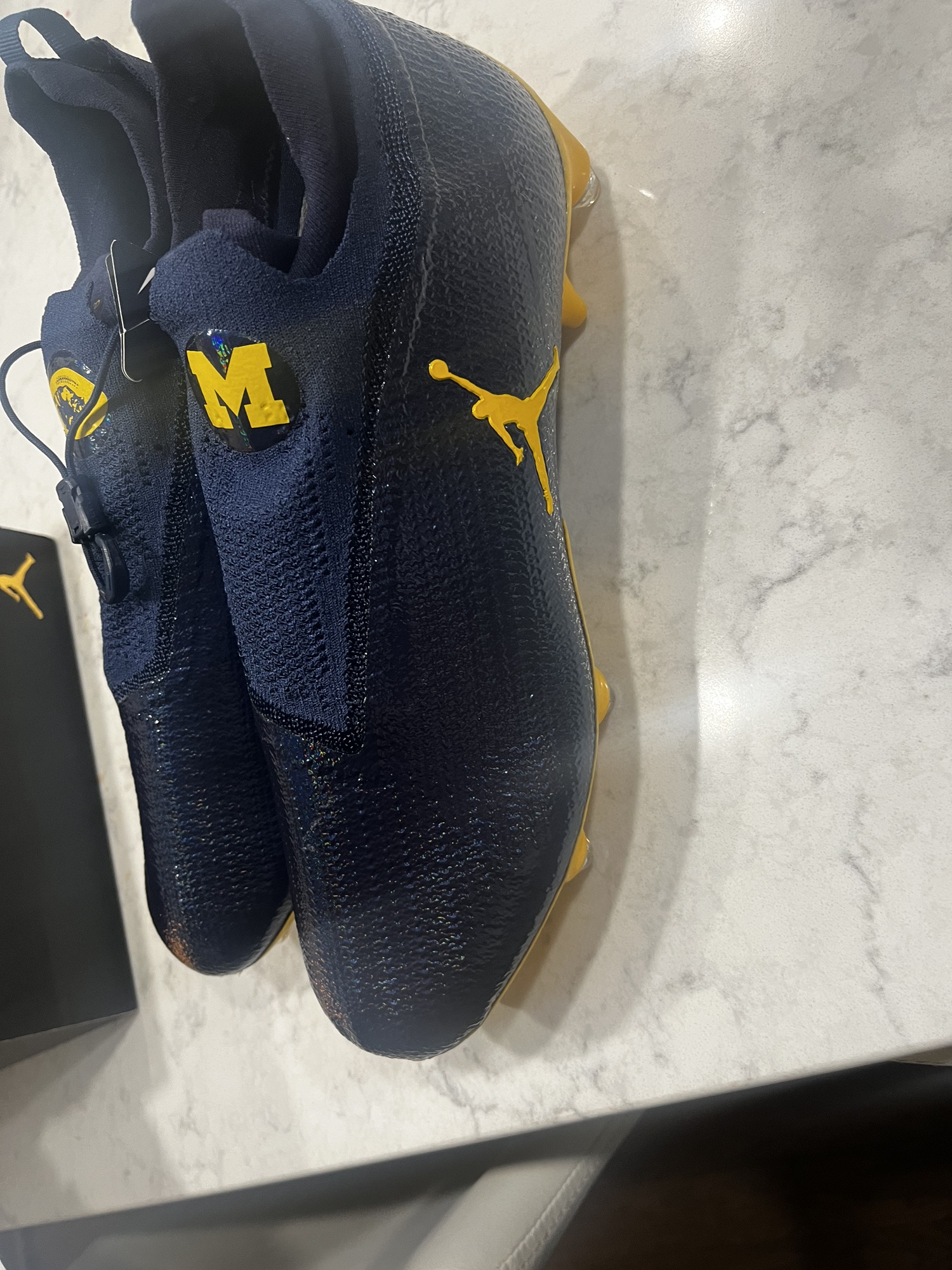 university of michigan football cleats