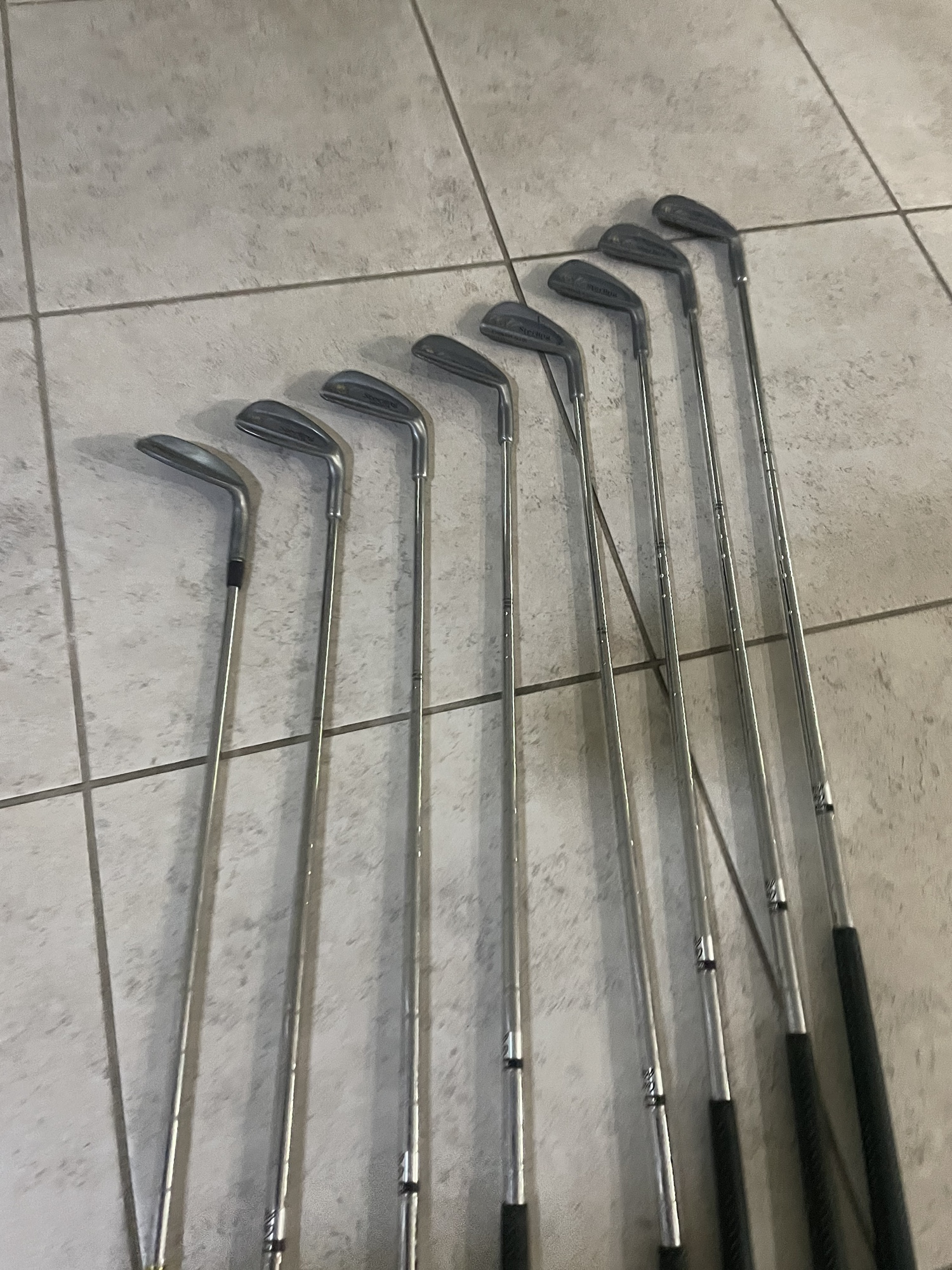 Arnold palmer Sterling 8 pc iron set in right hand