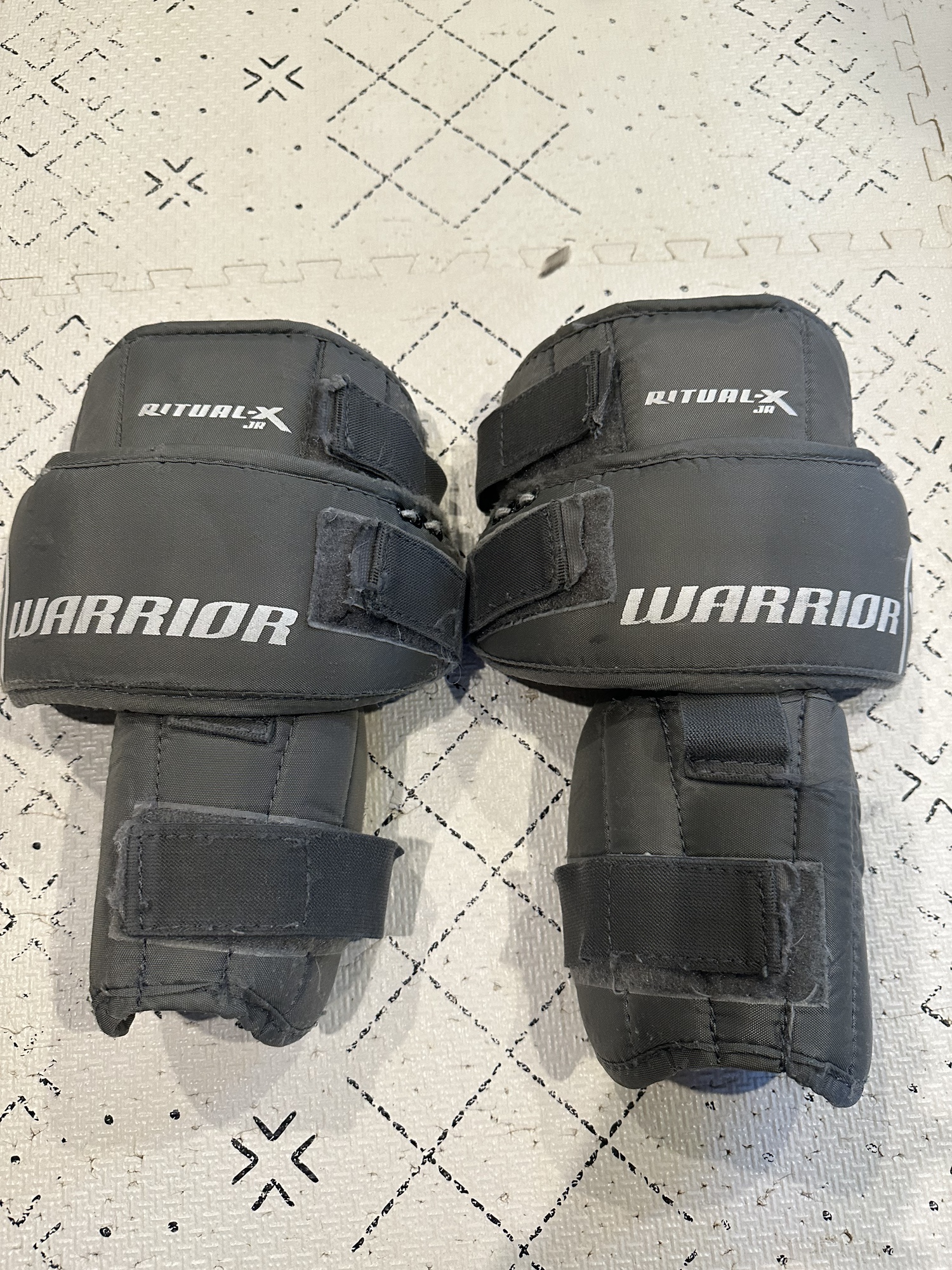 Used Warrior RitualX JR goalie knee pads SidelineSwap