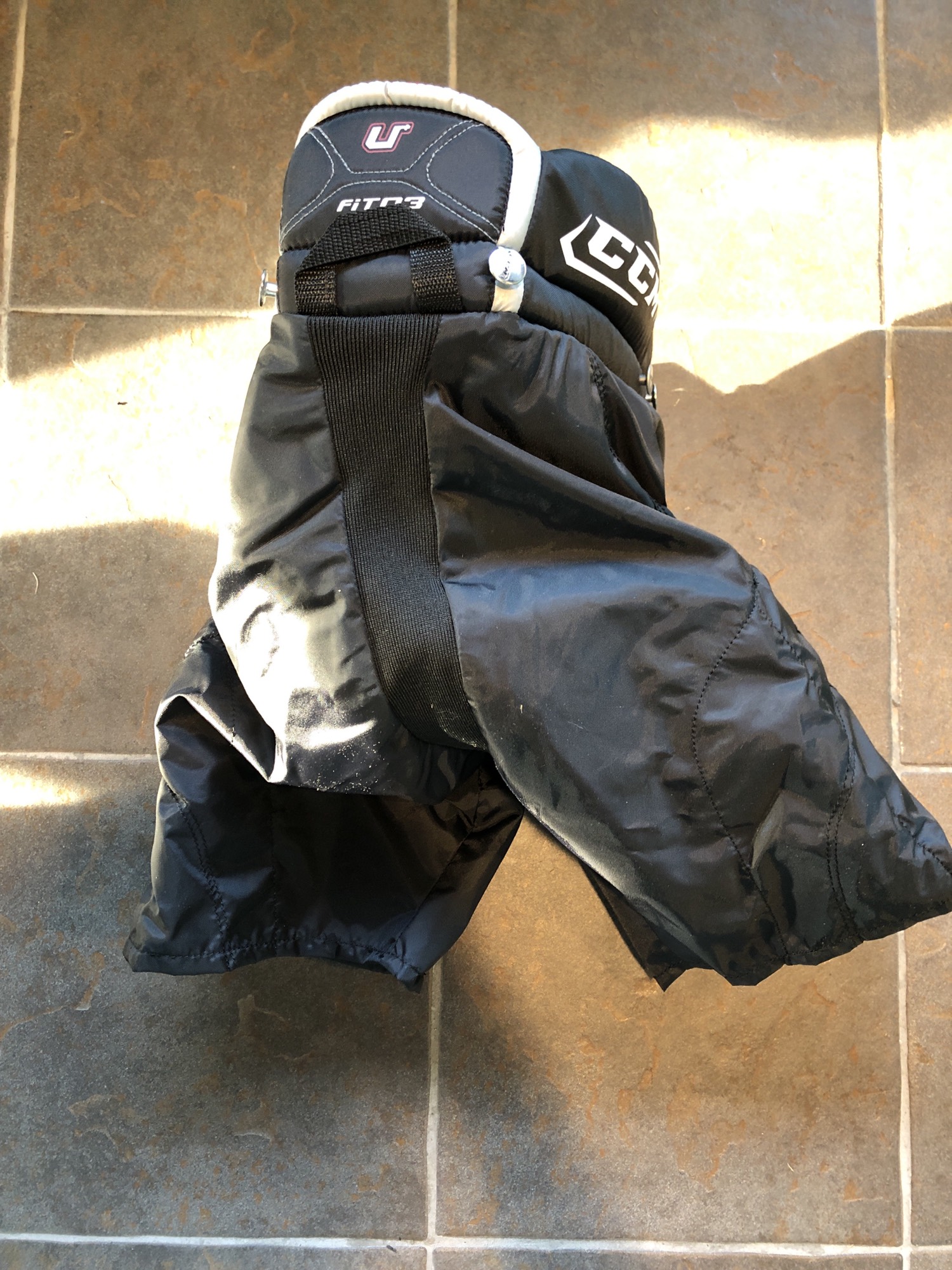 Used Youth CCM U+ Fit03 Hockey Pants (Size Large) SidelineSwap
