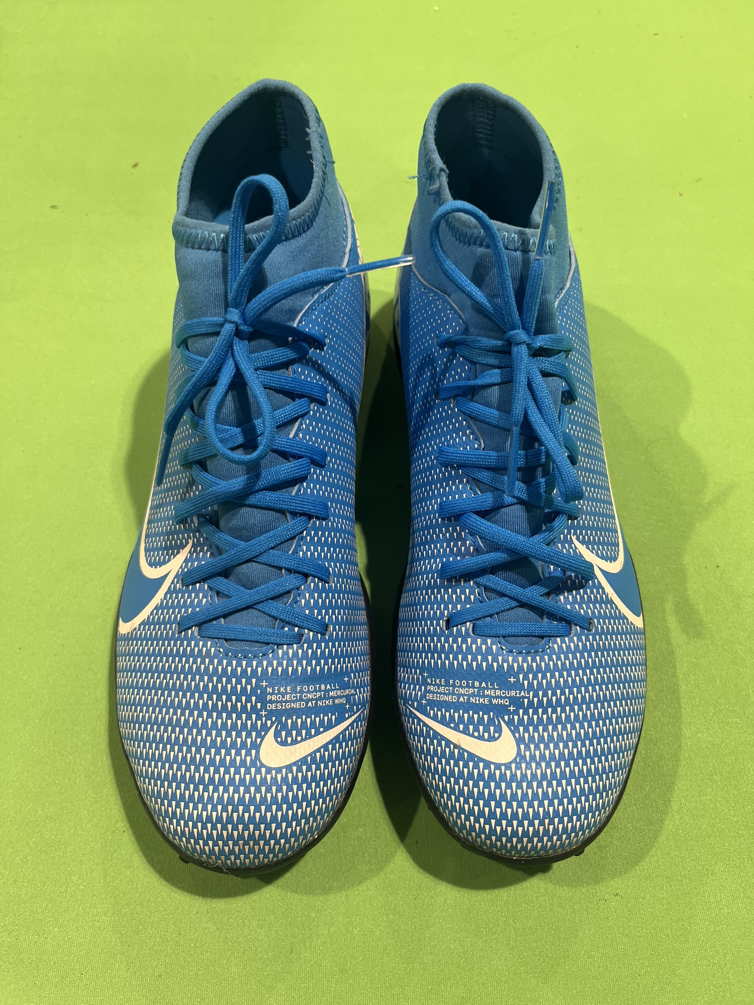 nike blue and gold cleats