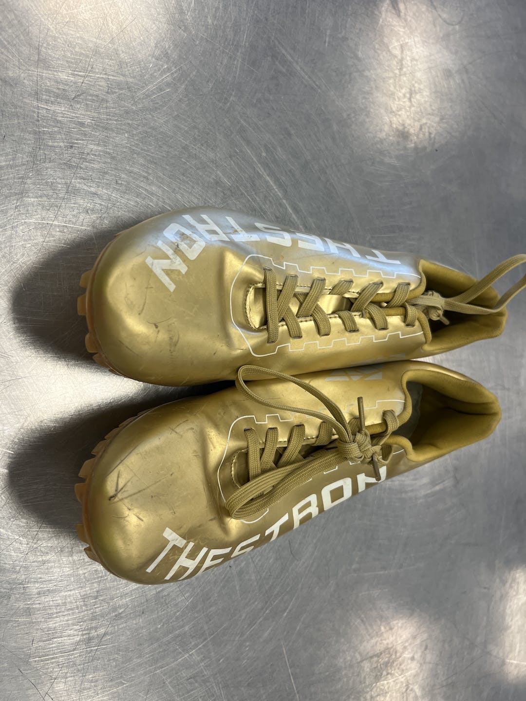 gold track cleats